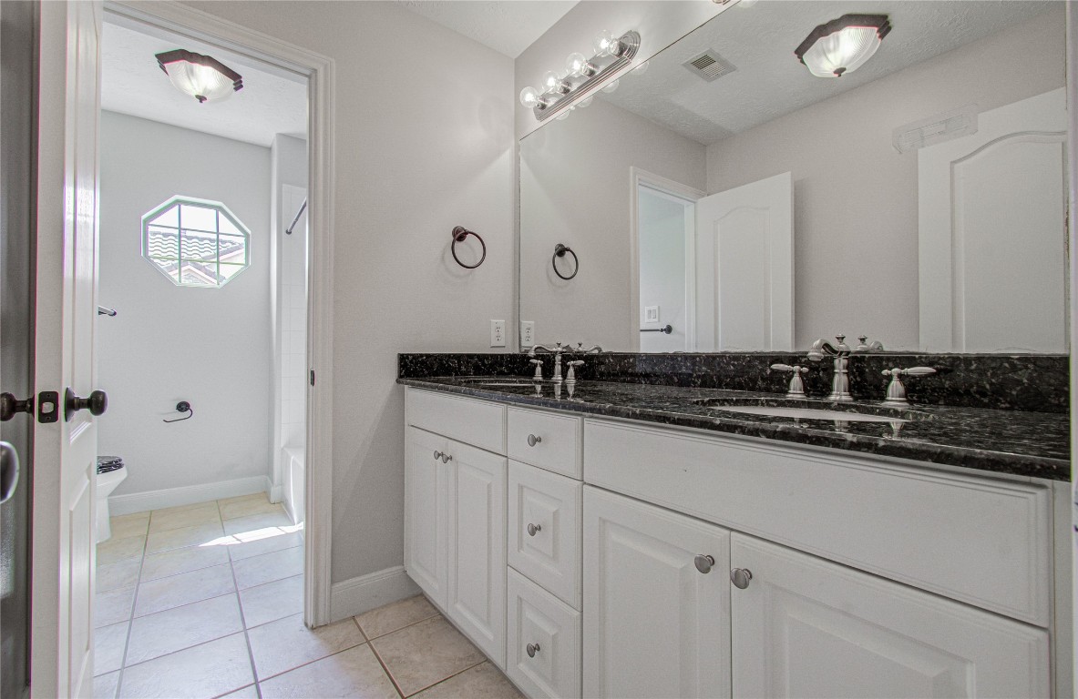 1463 Springrock Lane, Unit A Houston, TX 77055 - Photo 38 of 46 Spacious full bath conveniently located on the second floor, easily accessible to both bedrooms