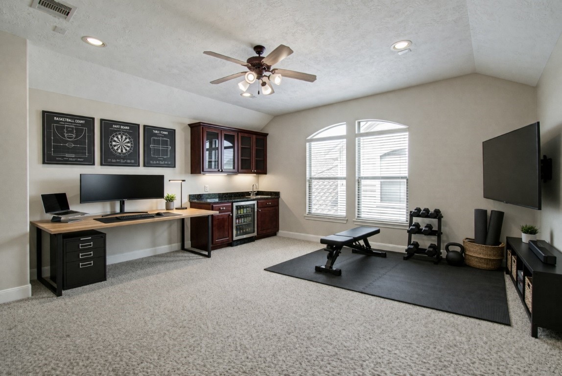 1463 Springrock Lane, Unit A Houston, TX 77055 - Photo 41 of 46 a living room with furniture flat screen tv and appliances