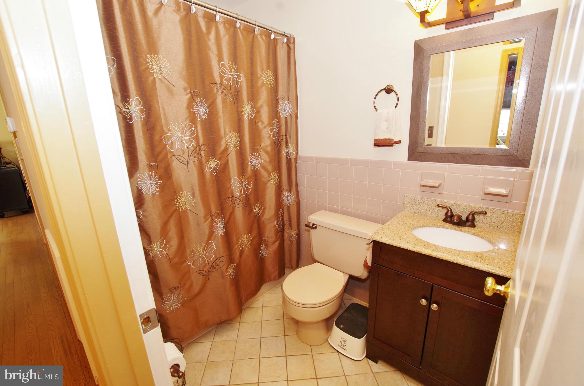4220 Stafford Road Olney, MD 20832 - Photo 16 of 30 Remodeled Hall Bath on Main Level