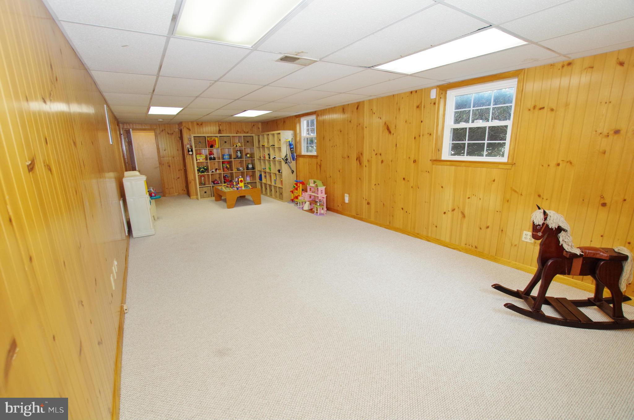 4220 Stafford Road Olney, MD 20832 - Photo 23 of 30 Recreation Room with Knotty Pine Paneling