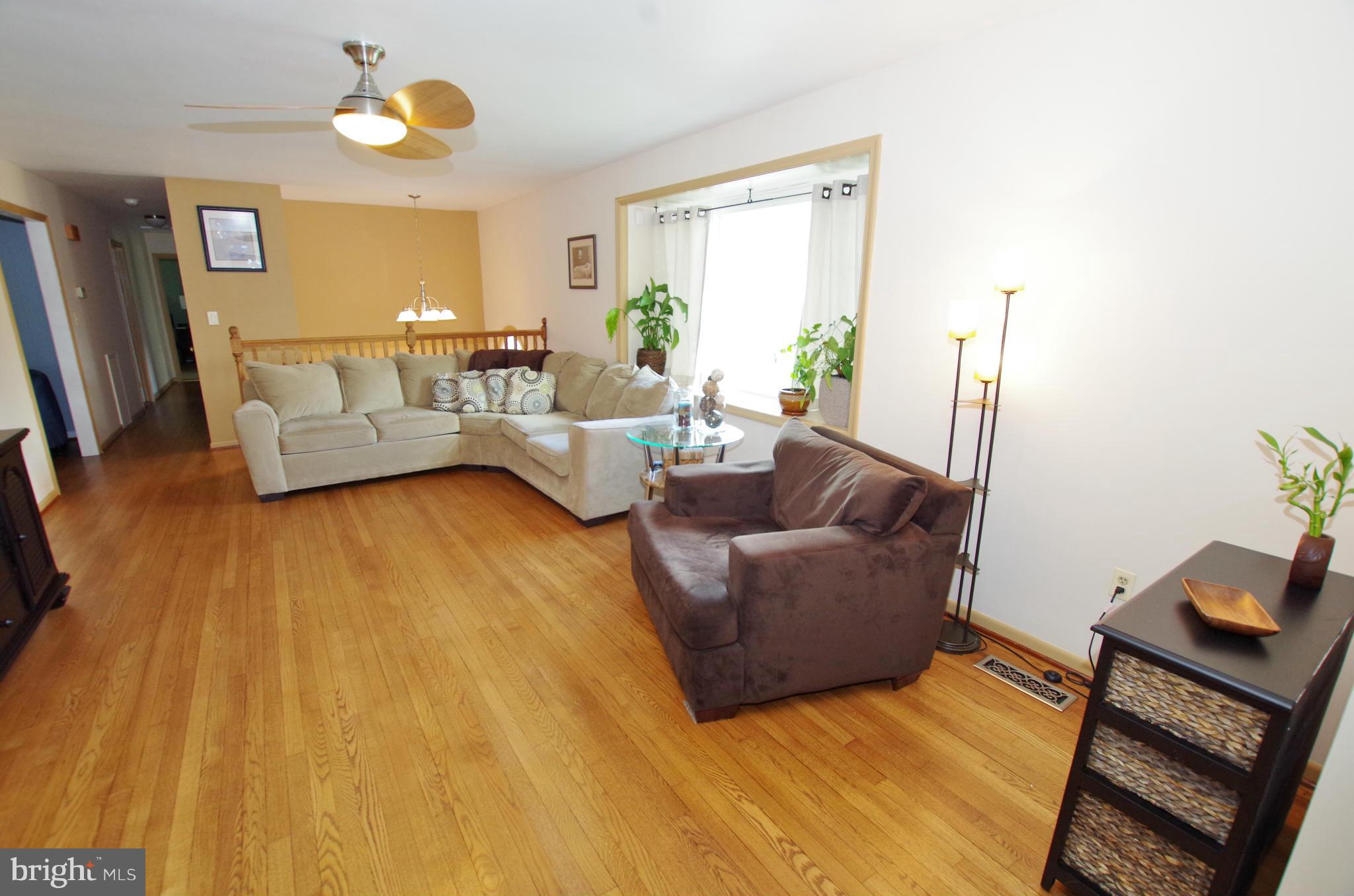 Sunlit Living Room with Bay Window