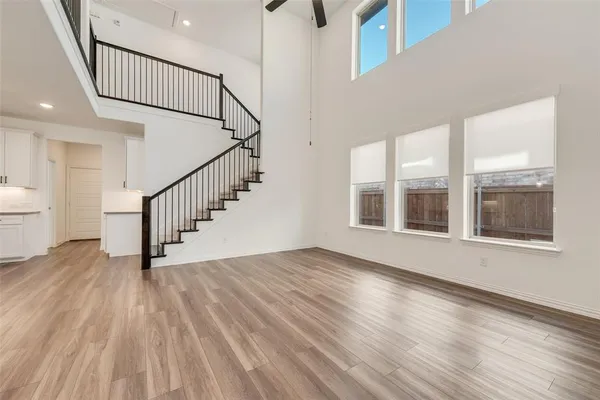 a view of an entryway with wooden floor