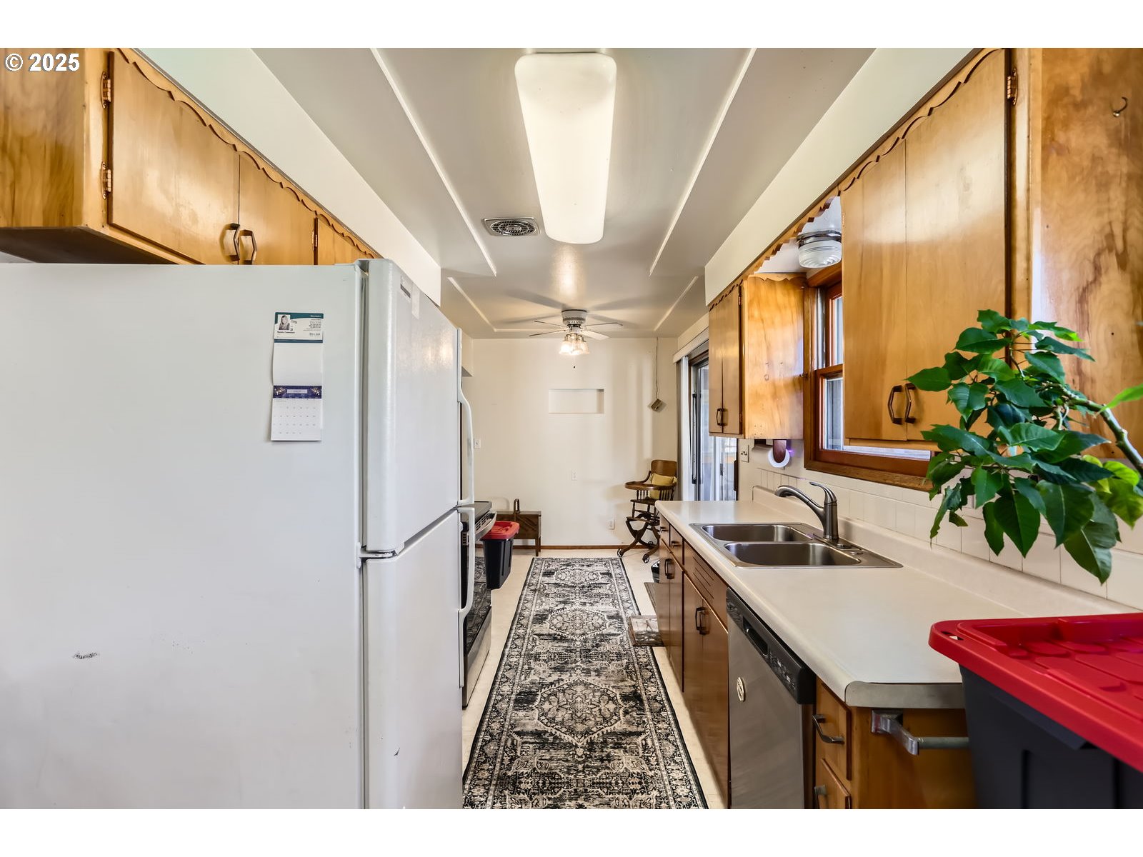 14031 Southeast Rhone Street Portland, OR 97236 - Photo 14 of 29 a very nice looking room with a couch