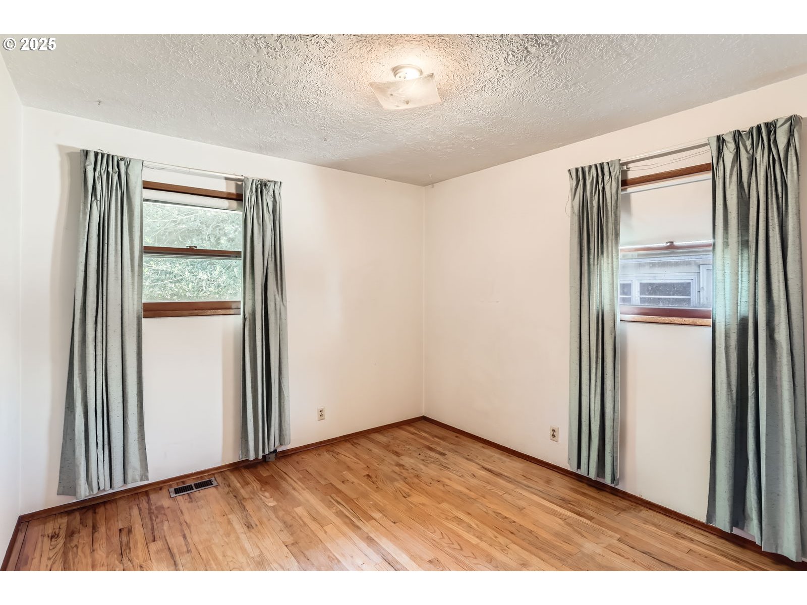 14031 Southeast Rhone Street Portland, OR 97236 - Photo 20 of 29 a view interior of the house and wooden floor
