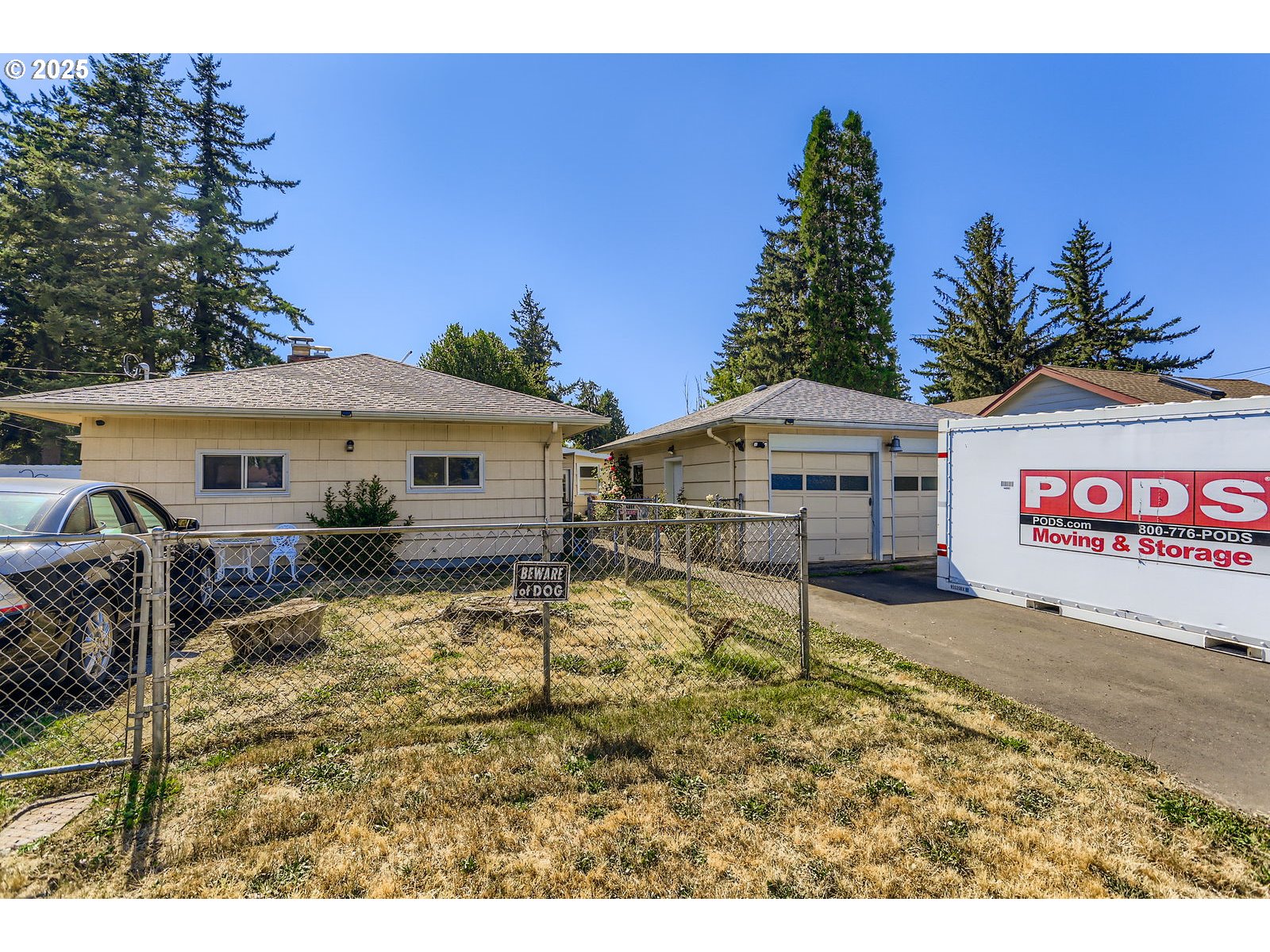 14031 Southeast Rhone Street Portland, OR 97236 - Photo 26 of 29 a backyard of a house