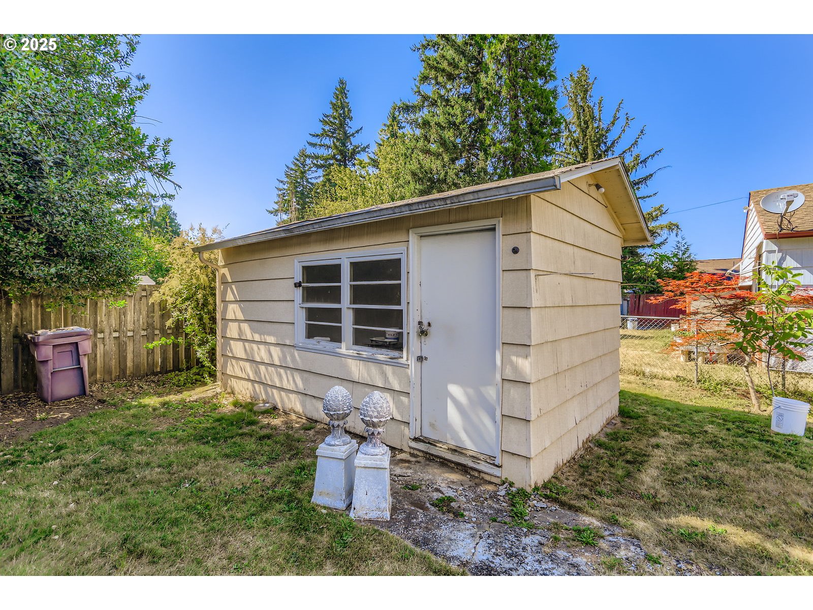 14031 Southeast Rhone Street Portland, OR 97236 - Photo 29 of 29 a view of a back yard of the house