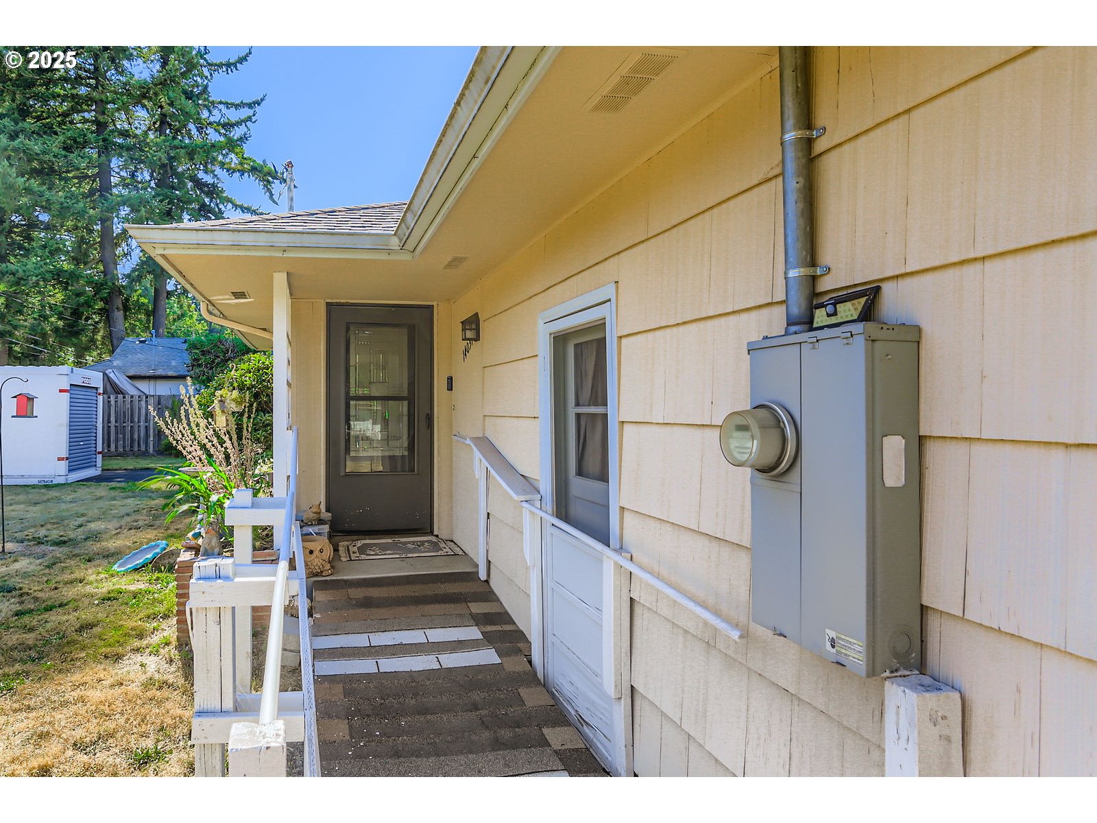 14031 Southeast Rhone Street Portland, OR 97236 - Photo 4 of 29 a view of a pathway of a house