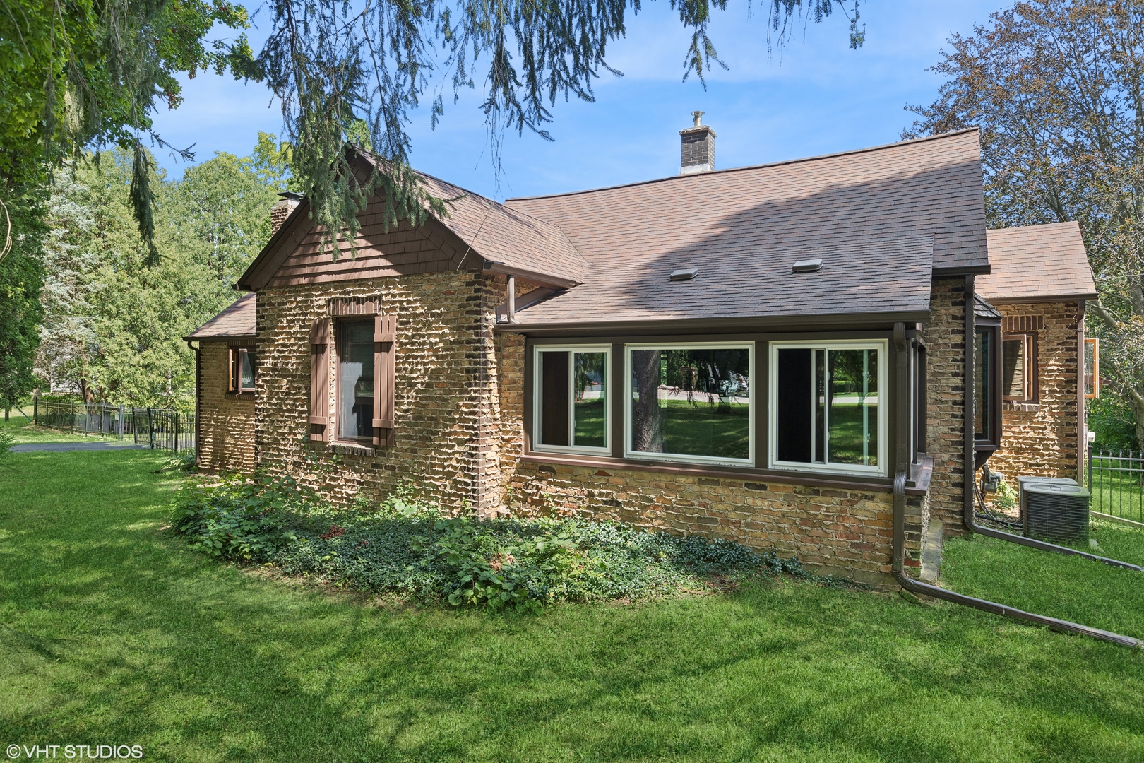 a view of a house with a garden