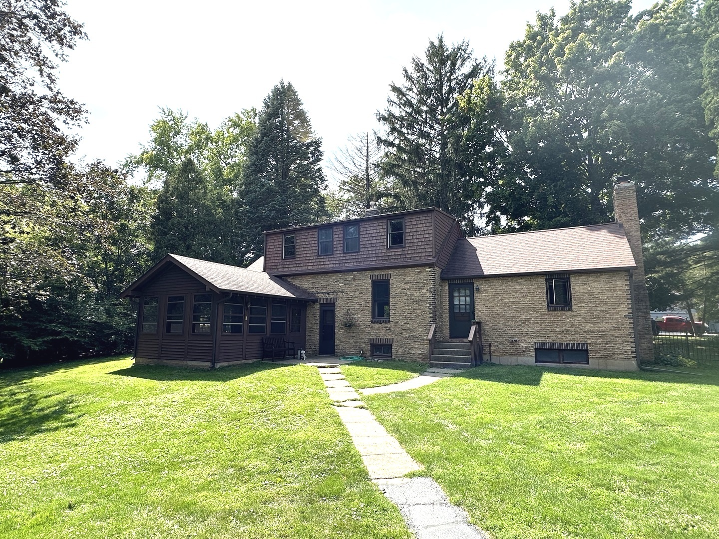 502 Raffel Road Woodstock, IL 60098 - Photo 2 of 24 a house view with a outdoor space