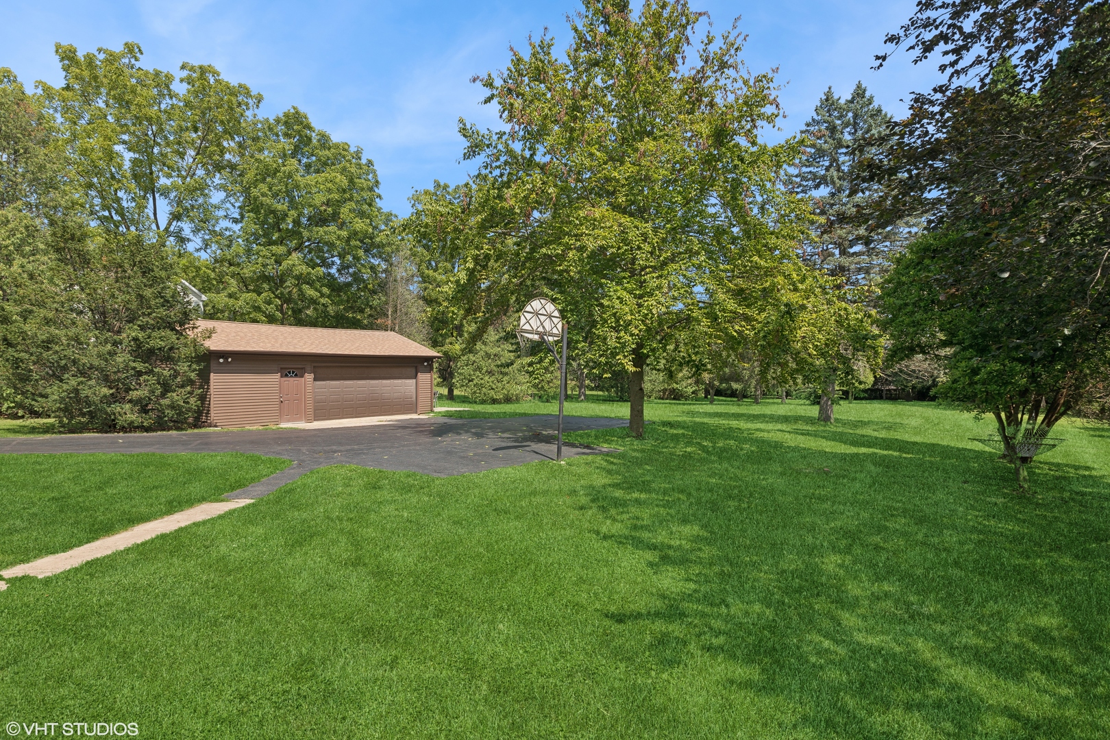 502 Raffel Road Woodstock, IL 60098 - Photo 21 of 24 a view of a back yard
