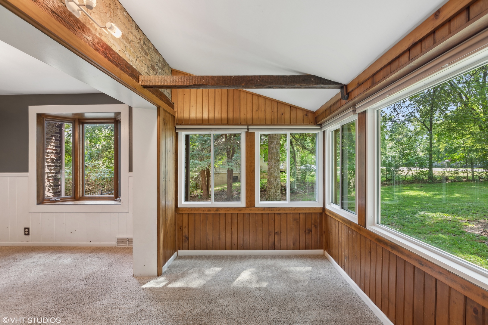 502 Raffel Road Woodstock, IL 60098 - Photo 6 of 24 a view of an empty room with a window