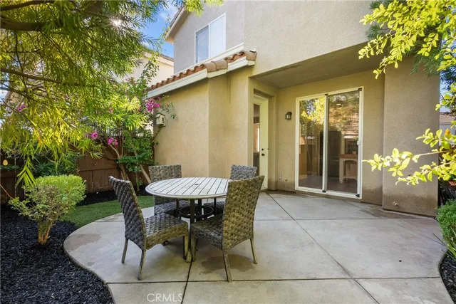 a view of a bench in a backyard