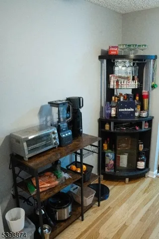 a room with furniture and wooden floor