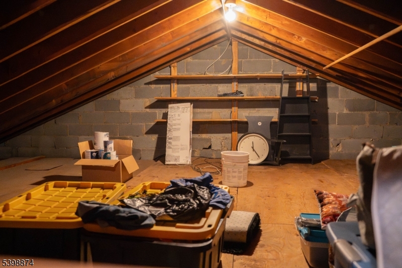 37 Espy Road, Unit 6B Caldwell, NJ 07006 - Photo 6 of 20 a view of a roof deck with chair and potted plants
