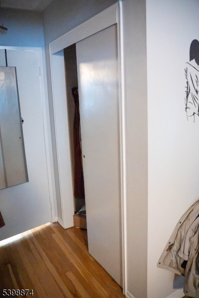 37 Espy Road, Unit 6B Caldwell, NJ 07006 - Photo 10 of 20 a view of bedroom with a bed and wooden floor