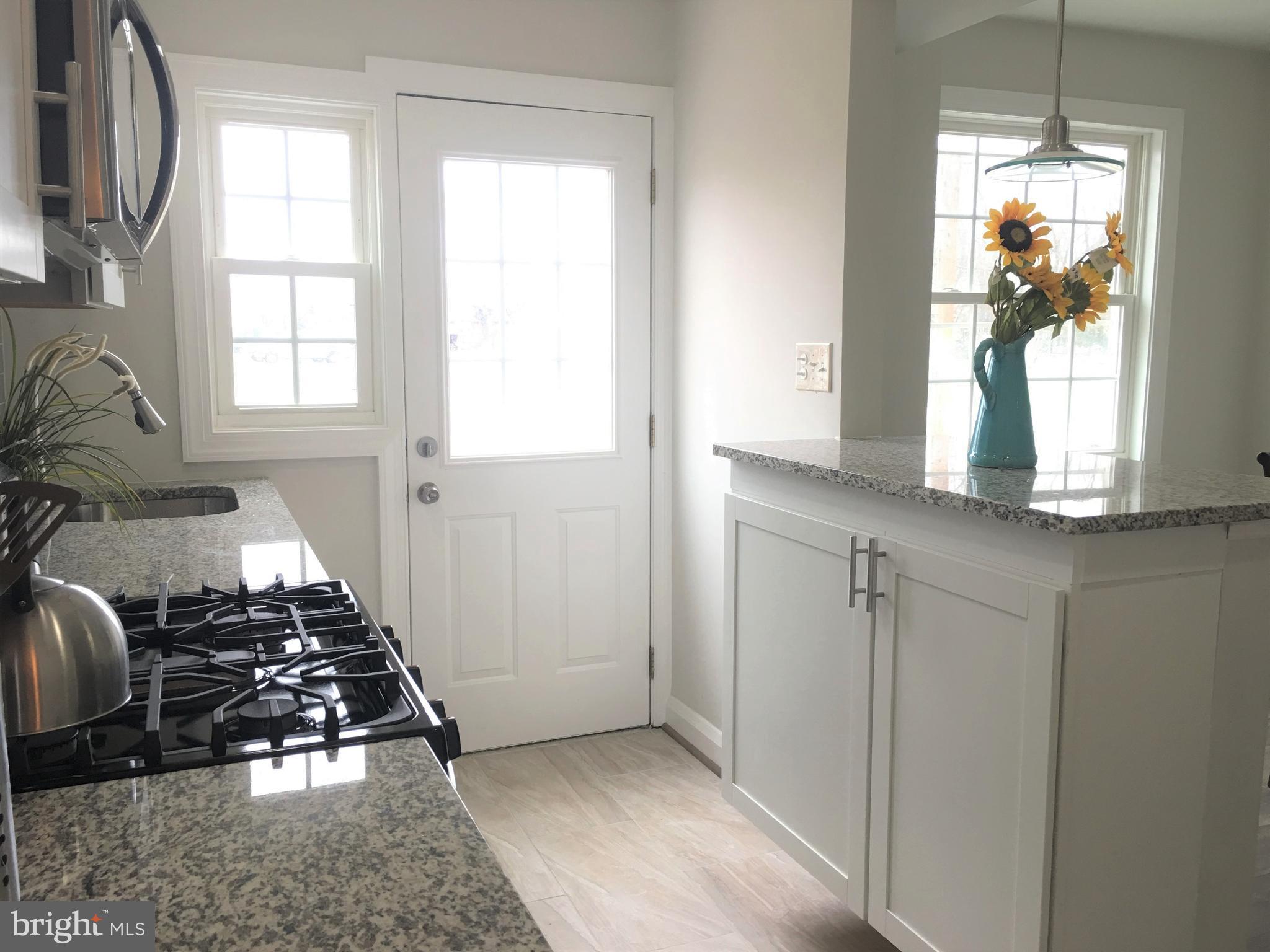 7968 Kavanagh Road Baltimore, MD 21222 - Photo 11 of 30 a kitchen with sink and window
