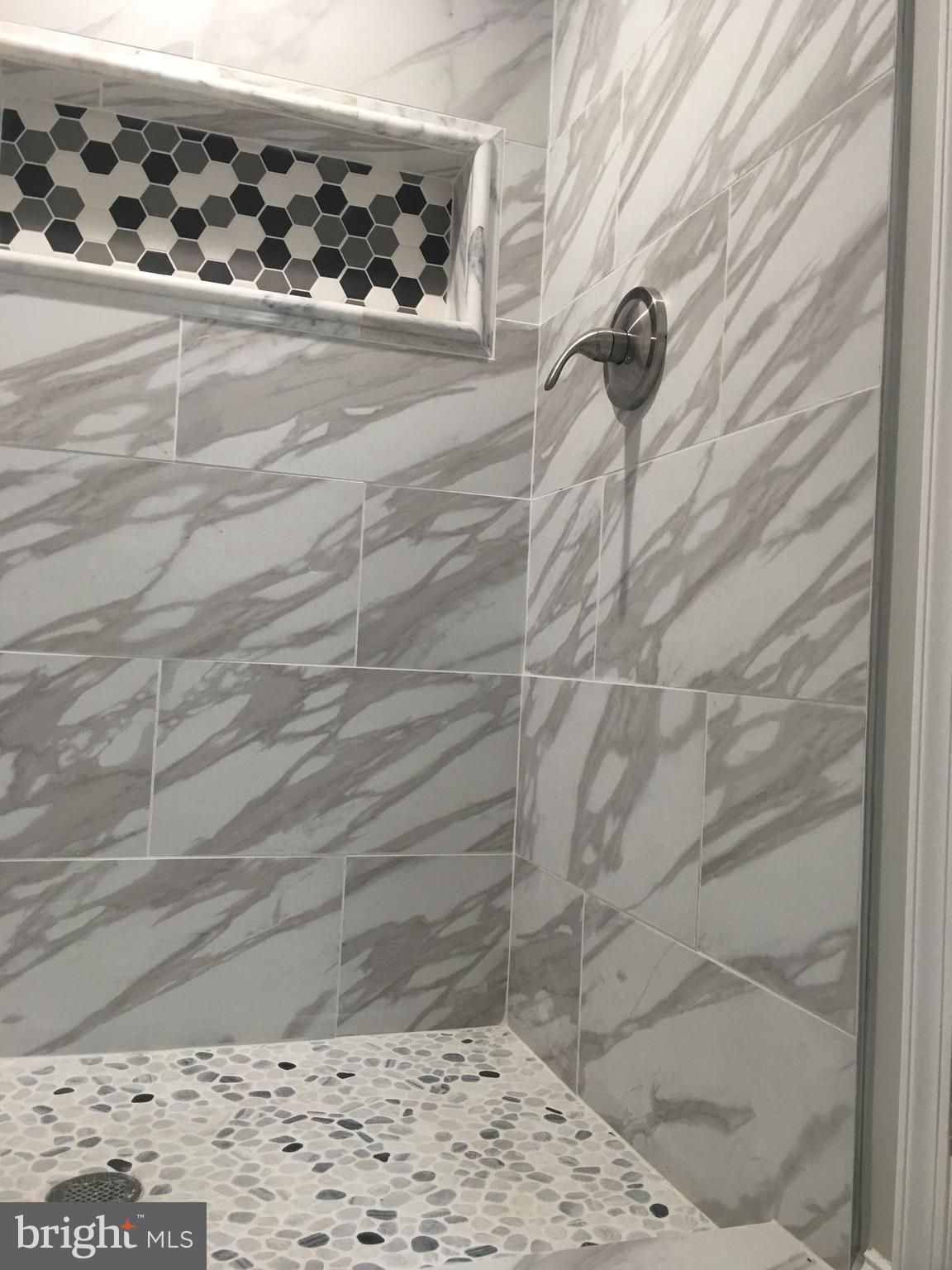 7968 Kavanagh Road Baltimore, MD 21222 - Photo 21 of 30 a bathroom with a shower