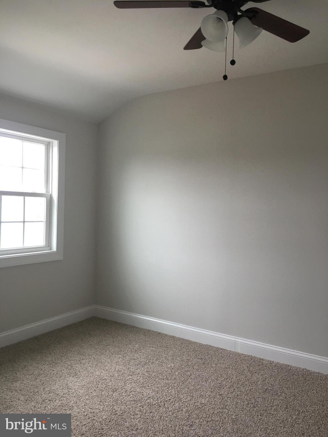 7968 Kavanagh Road Baltimore, MD 21222 - Photo 27 of 30 an empty room with a window