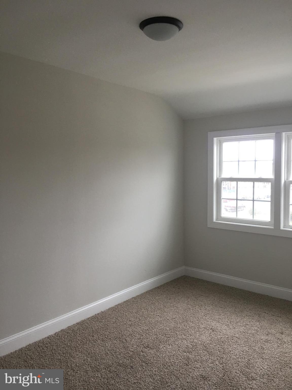 7968 Kavanagh Road Baltimore, MD 21222 - Photo 29 of 30 an empty room with a window