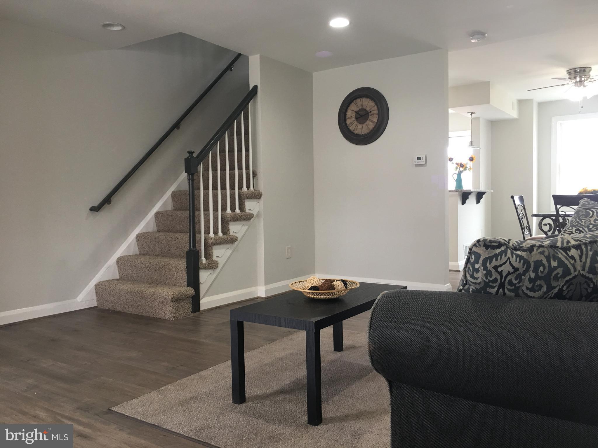 7968 Kavanagh Road Baltimore, MD 21222 - Photo 4 of 30 a view of a hallway with seating area