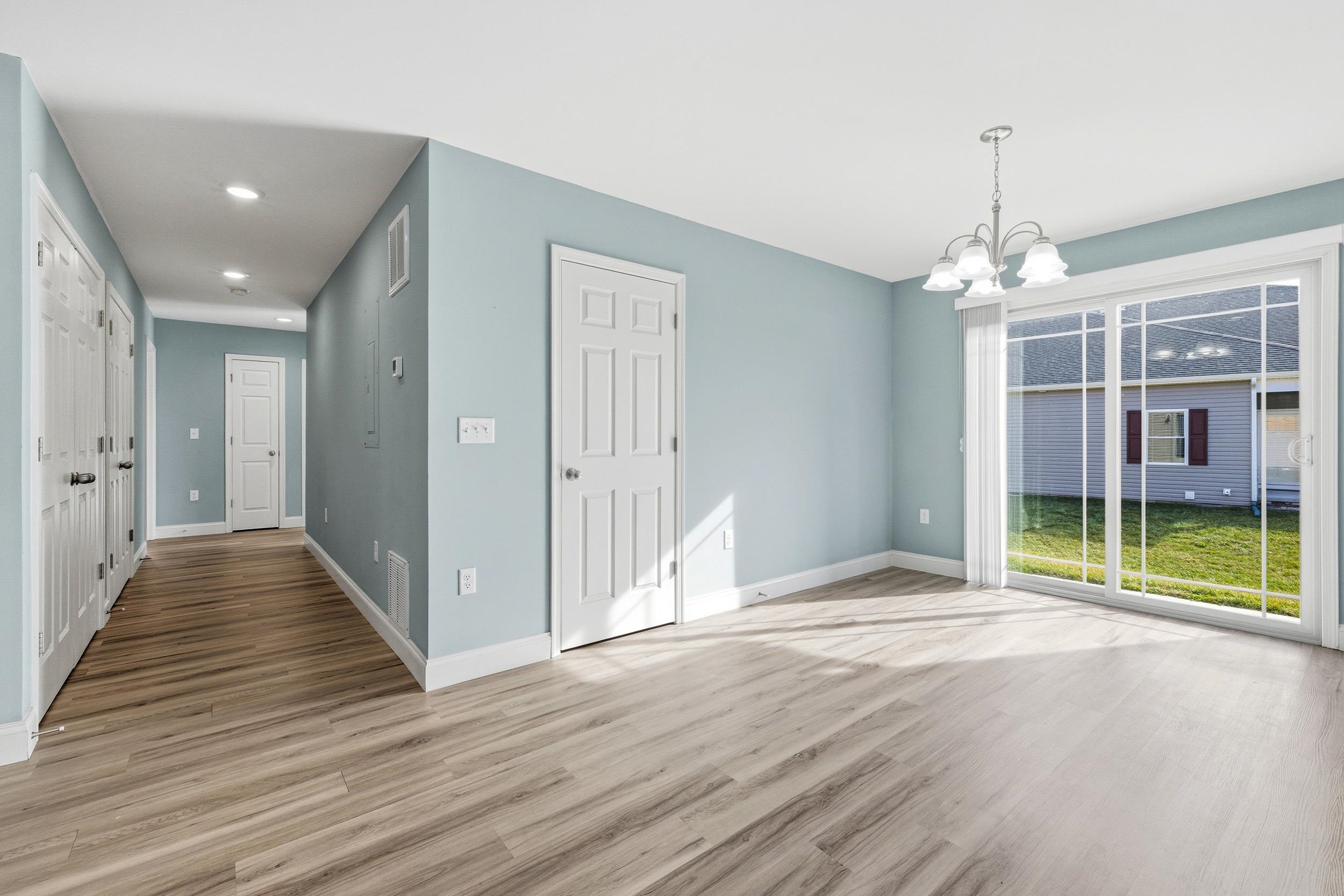 136 Millstone Street Bridgewater, VA 22812 - Photo 12 of 75 a view of a room with wooden floor fireplace and windows