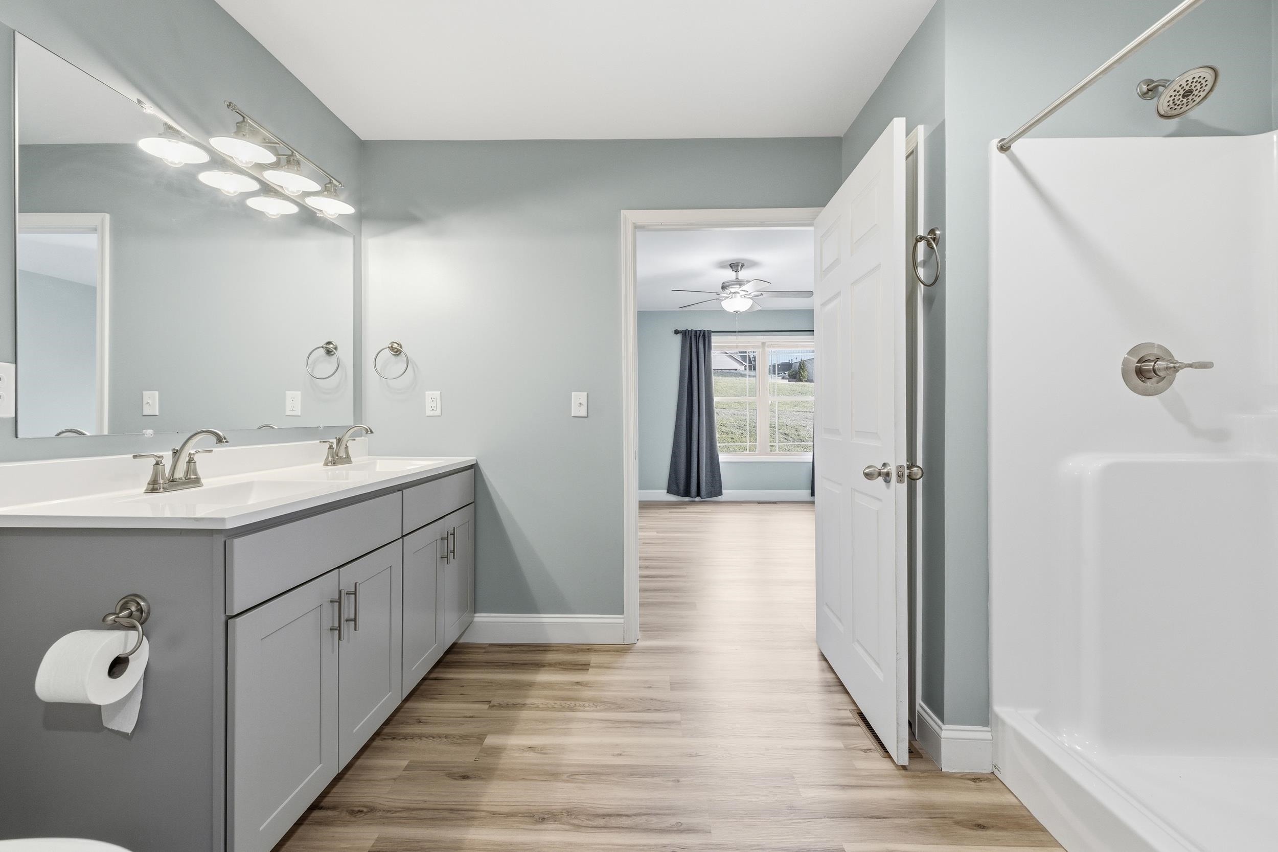 136 Millstone Street Bridgewater, VA 22812 - Photo 28 of 75 a spacious bathroom with a double vanity sink and mirror