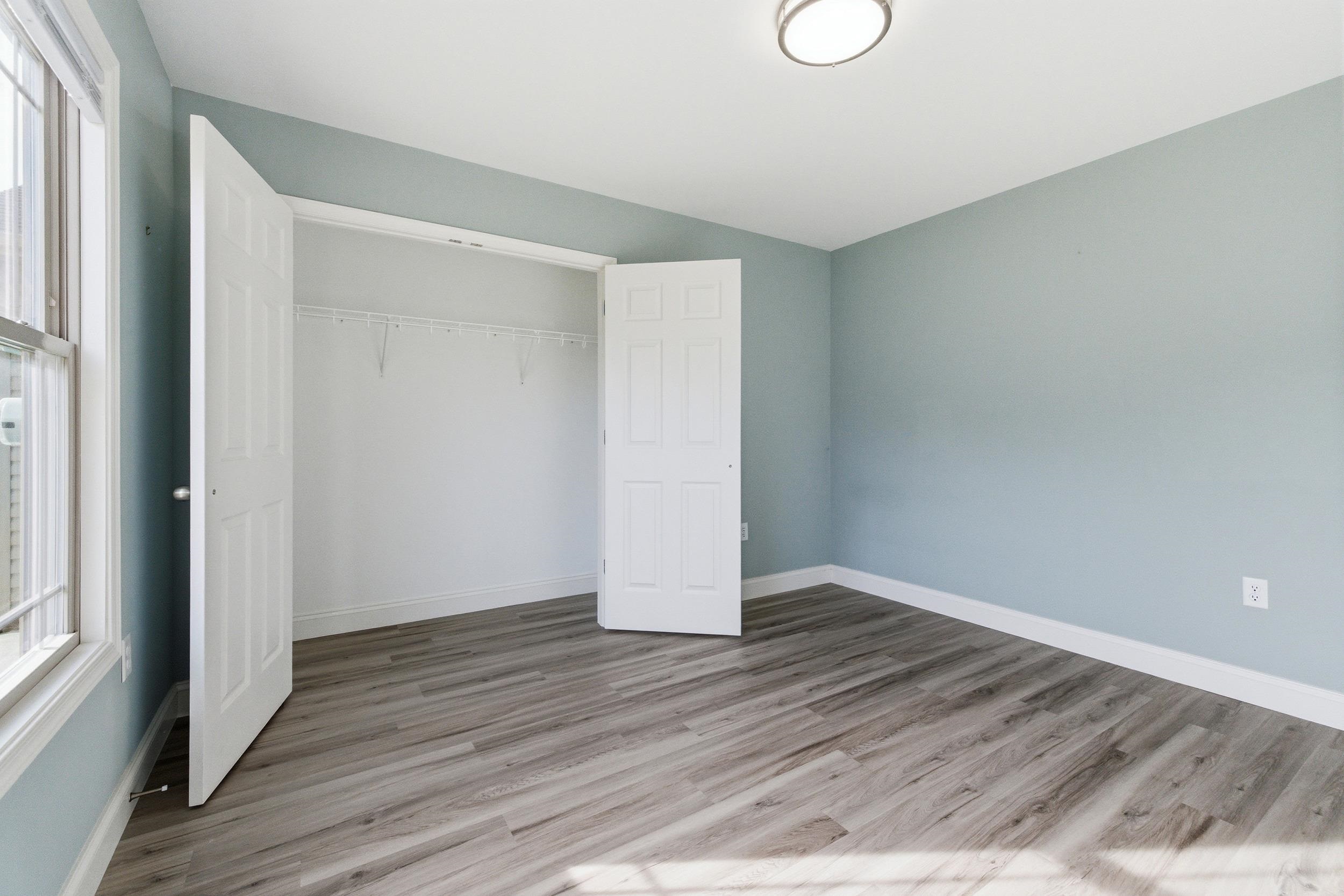 136 Millstone Street Bridgewater, VA 22812 - Photo 38 of 75 an empty room with wooden floor and windows