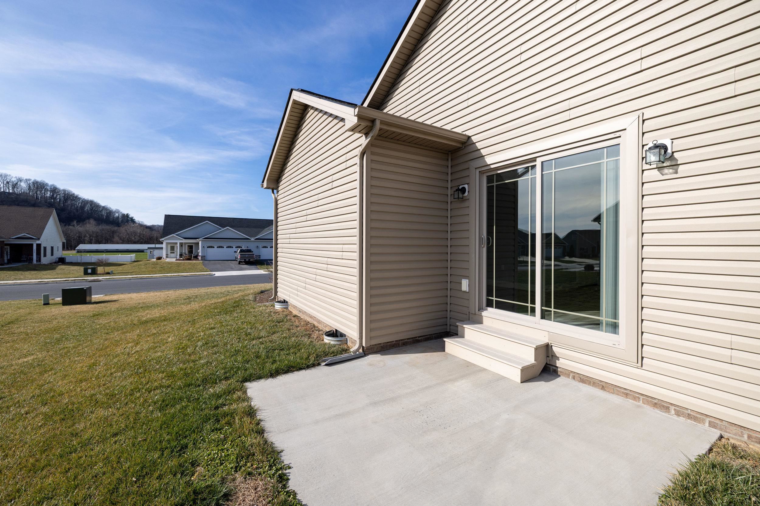 136 Millstone Street Bridgewater, VA 22812 - Photo 55 of 75 a view of a white house with a yard