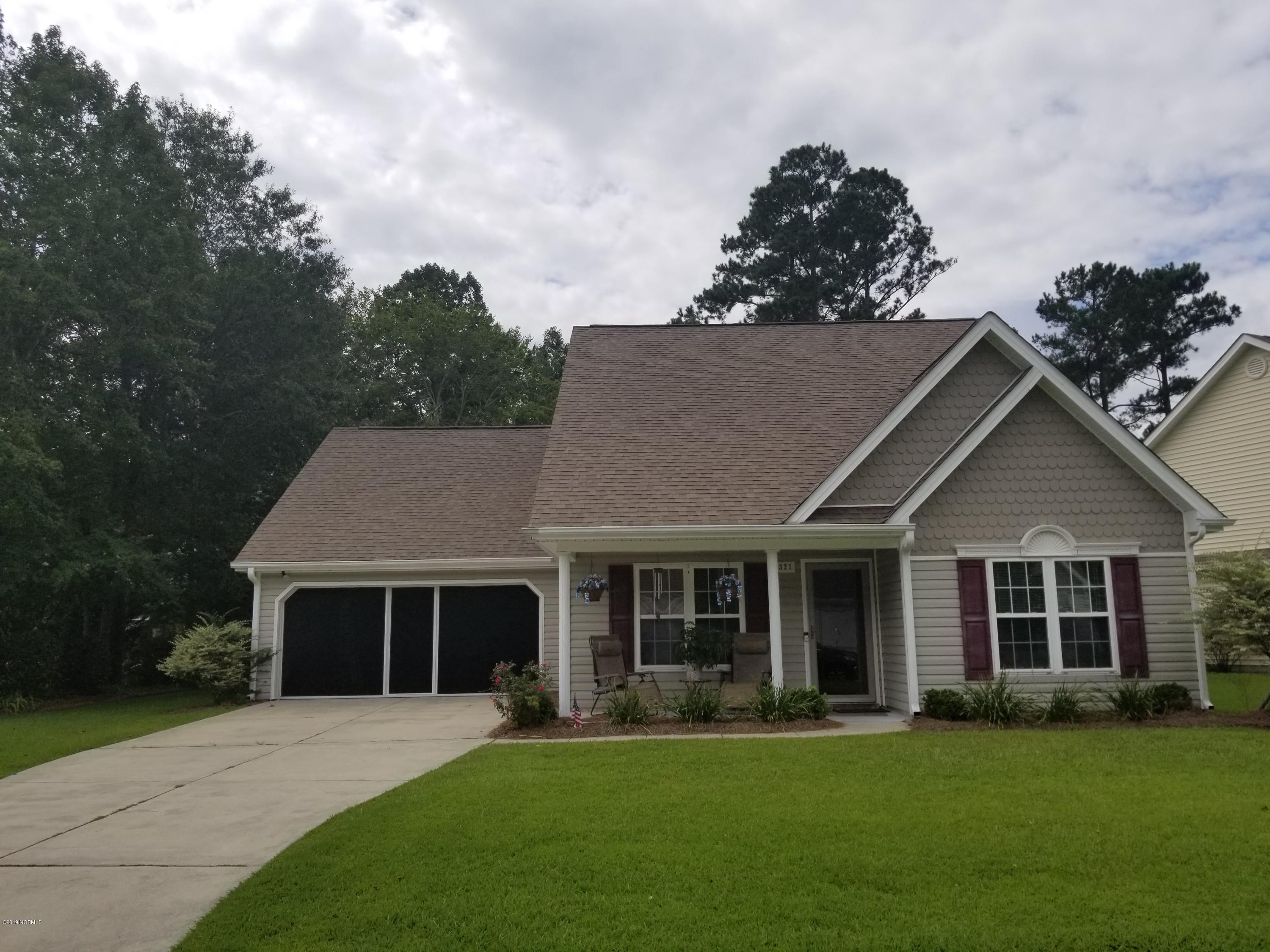 321 Neuchatel Road New Bern, NC 28562 - Photo 3 of 29 GARAGE DOOR WITH SCREEN