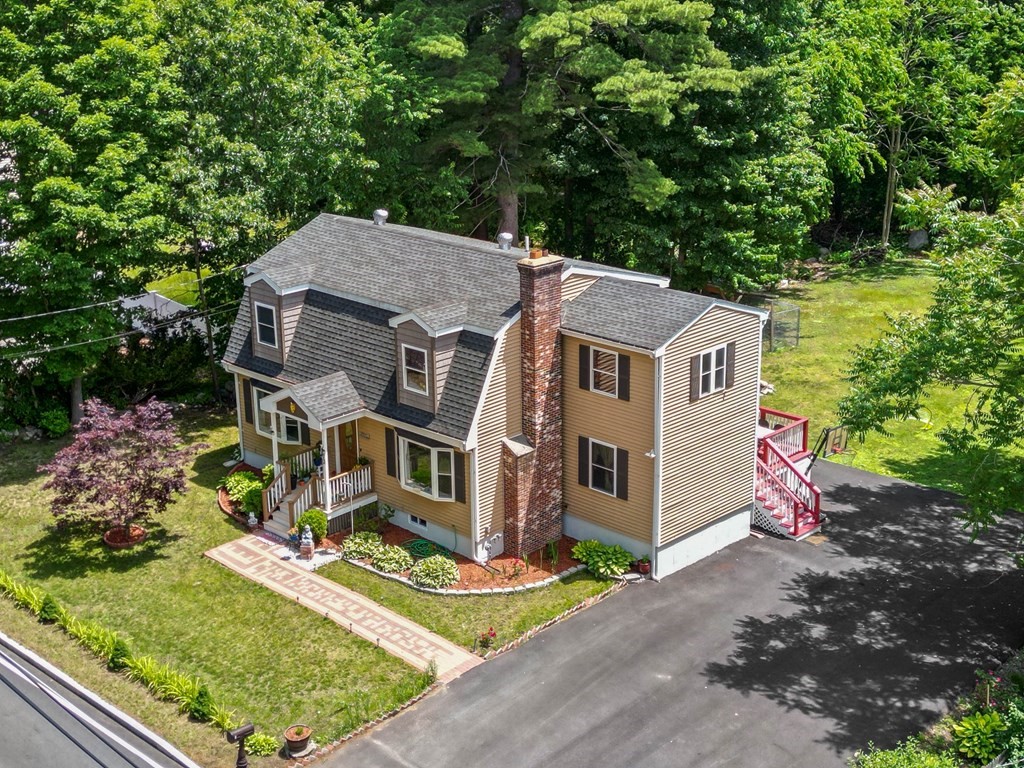 73 Baldwin Road Billerica, MA 01821 - Photo 1 of 40 front view of a house with a yard