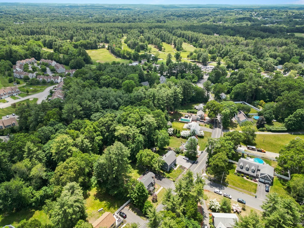 73 Baldwin Road Billerica, MA 01821 - Photo 3 of 40 an aerial view of a residential houses with outdoor space and trees