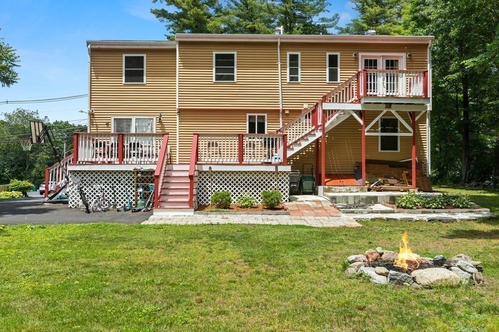 73 Baldwin Road Billerica, MA 01821 - Photo 32 of 40 a view of a house with a swimming pool