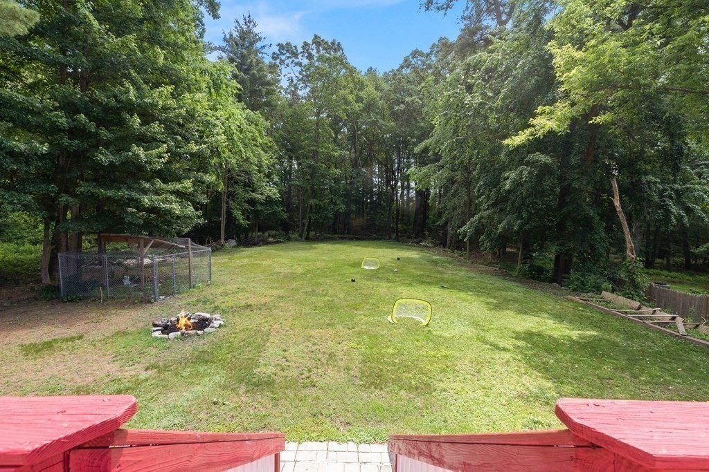 73 Baldwin Road Billerica, MA 01821 - Photo 34 of 40 a backyard of a house with table and chairs