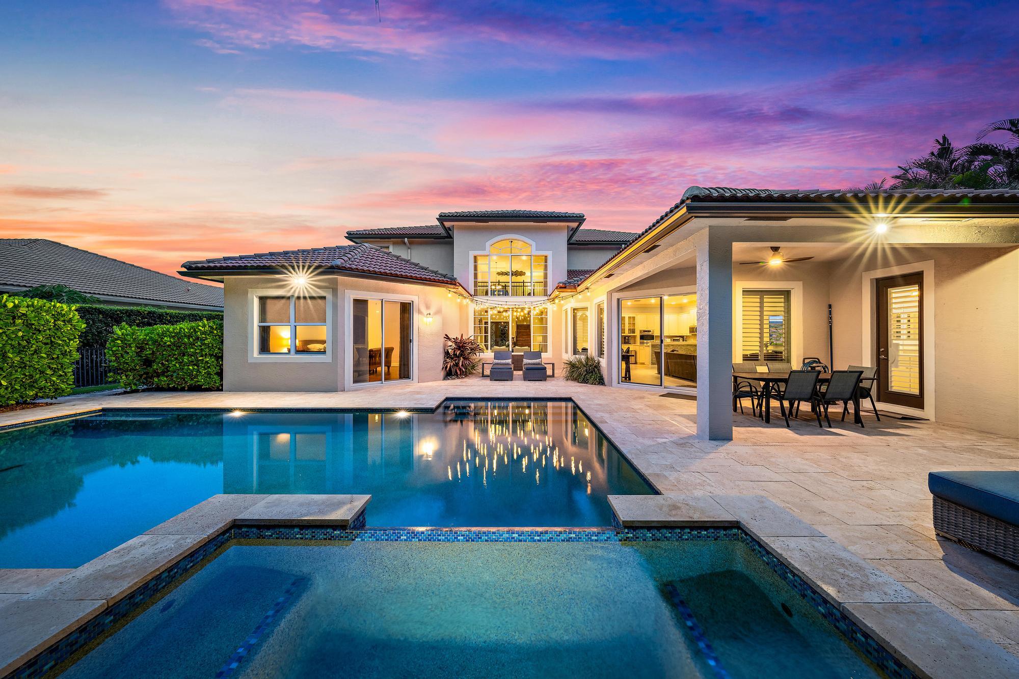 283 Rudder Cay Way Jupiter, FL 33458 - Photo 2 of 41 a view of a house with swimming pool yard and sitting area