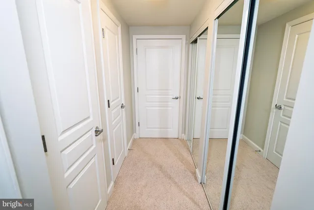a view of a bathroom with a glass shower door