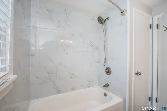 a bathroom with a bathtub