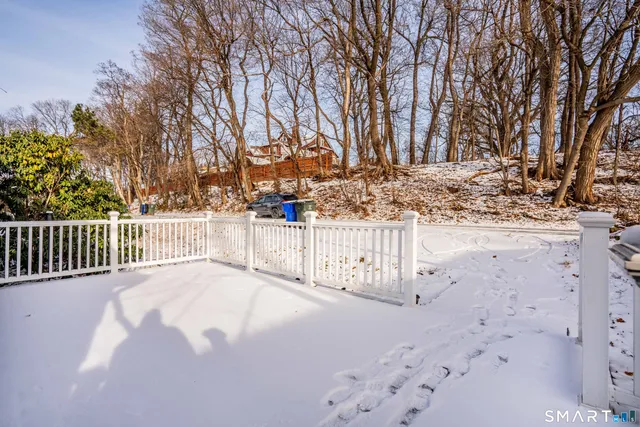 a view of a wooden fence