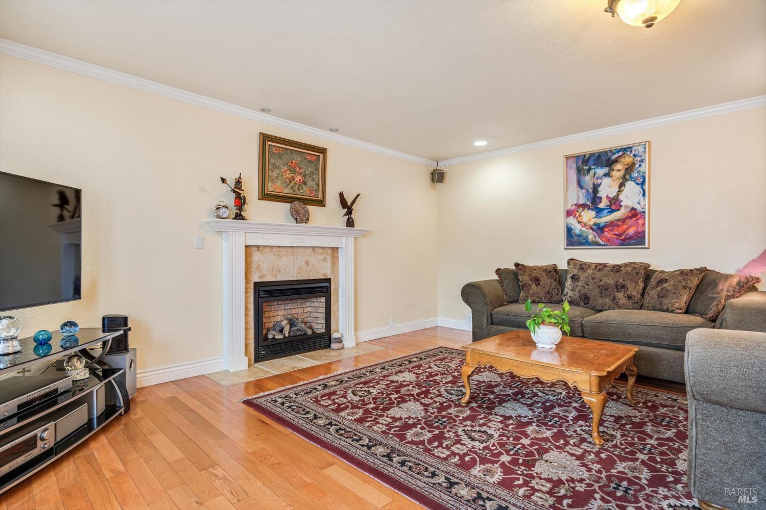 971 Eleanor Avenue Rohnert Park, CA 94928 - Photo 8 of 25 a living room with furniture and a fireplace