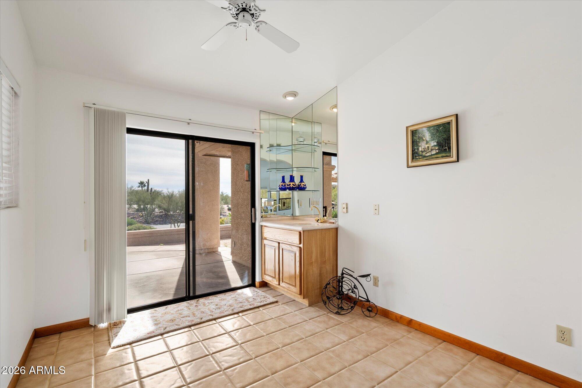 9520 Romping Road Carefree, AZ 85377 - Photo 11 of 45 Den with wet bar