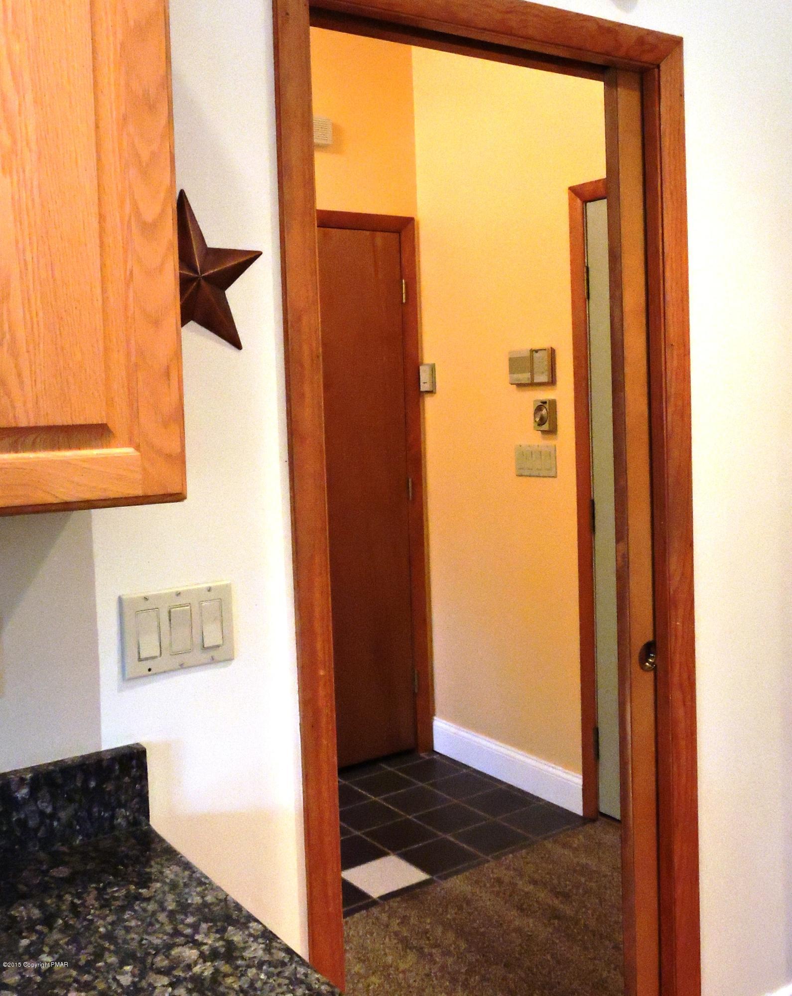 5138 Hounds Ear Road Tobyhanna, PA 18466 - Photo 14 of 56 Pocket Door from Kitchen into Laundry/Mu