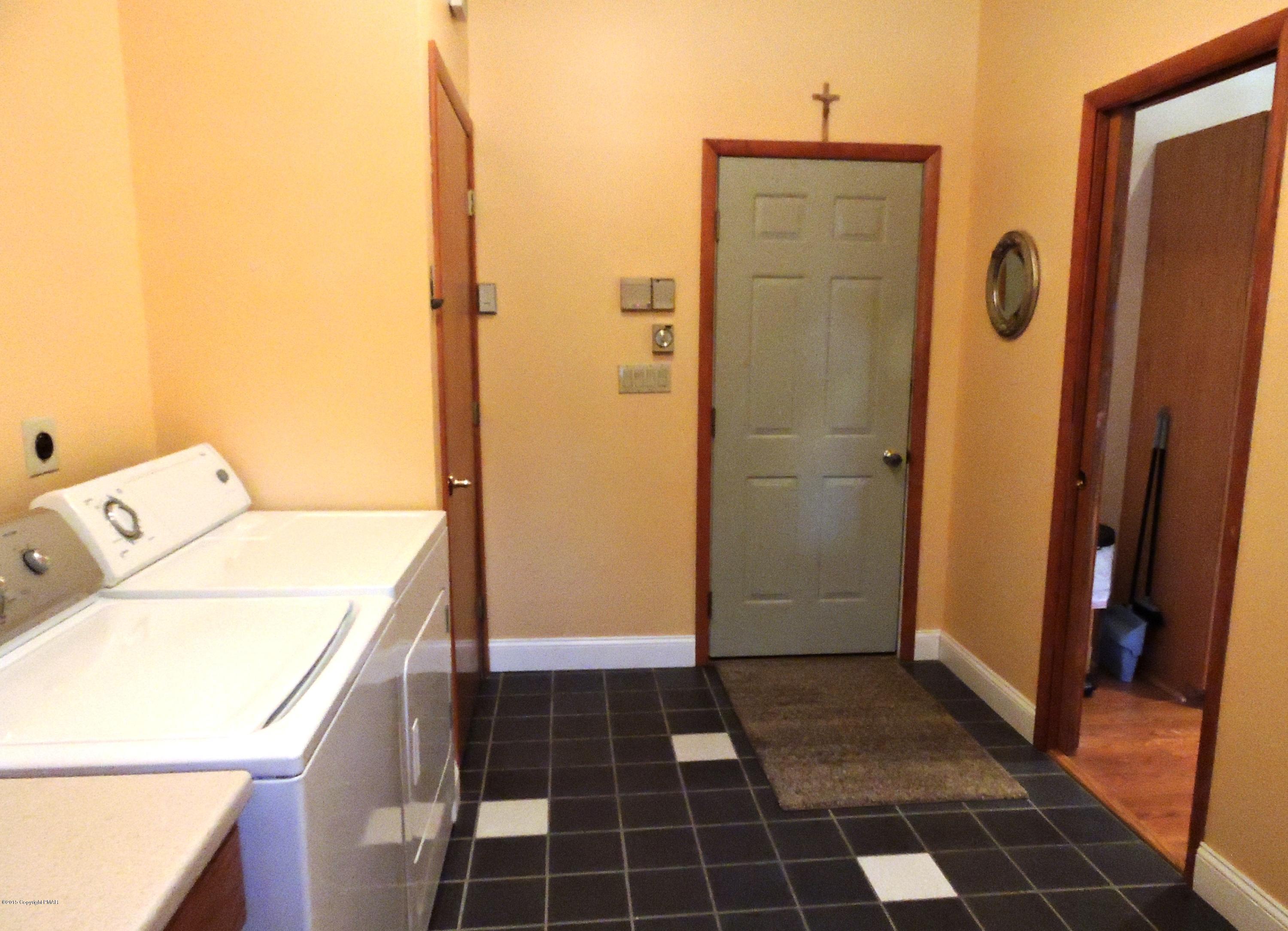 5138 Hounds Ear Road Tobyhanna, PA 18466 - Photo 15 of 56 Laundry, Coat Closet, Door to Garage