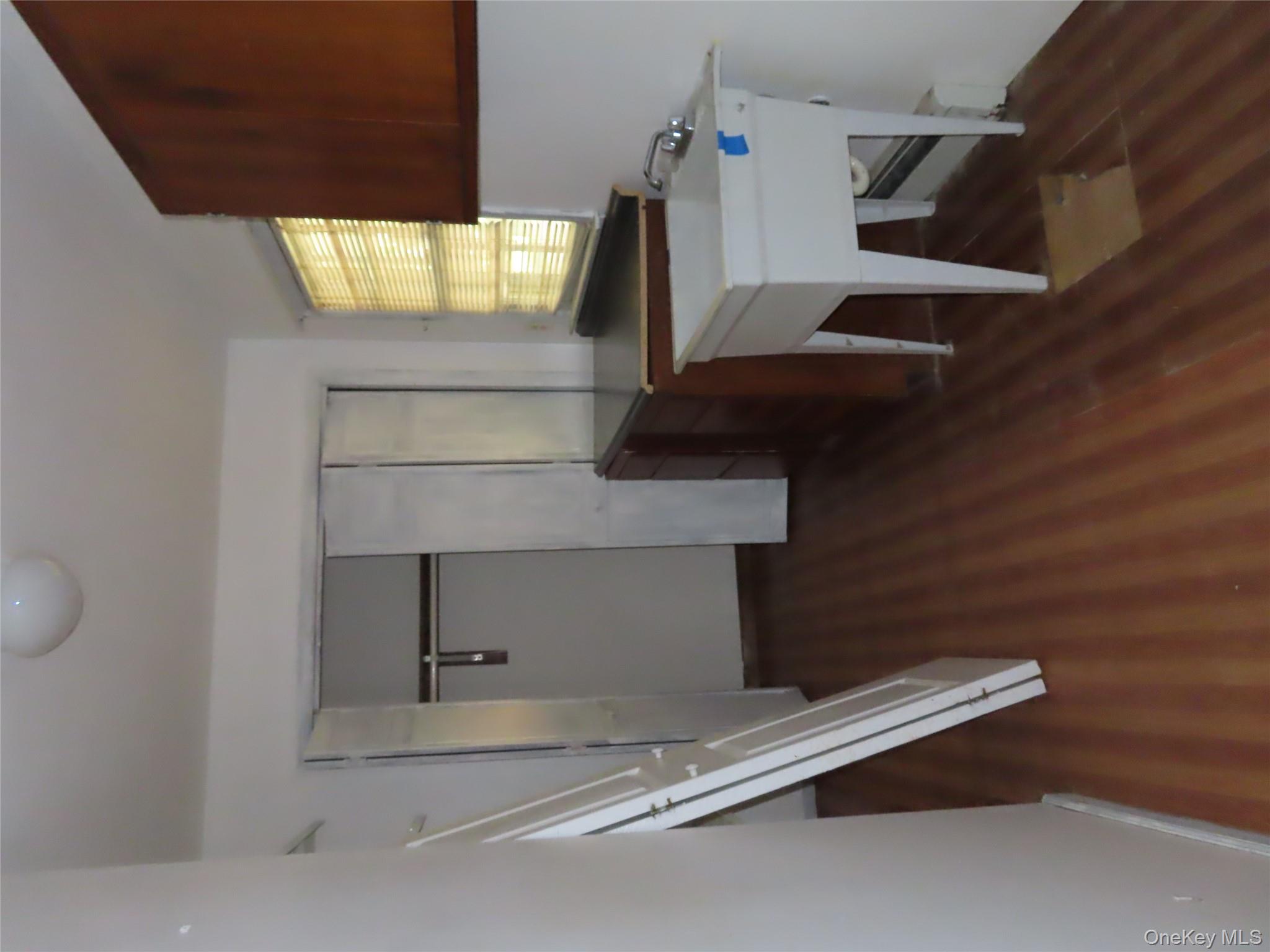 26 Darren Road LaGrangeville, NY 12540 - Photo 13 of 28 laundry room with closets and slop sink