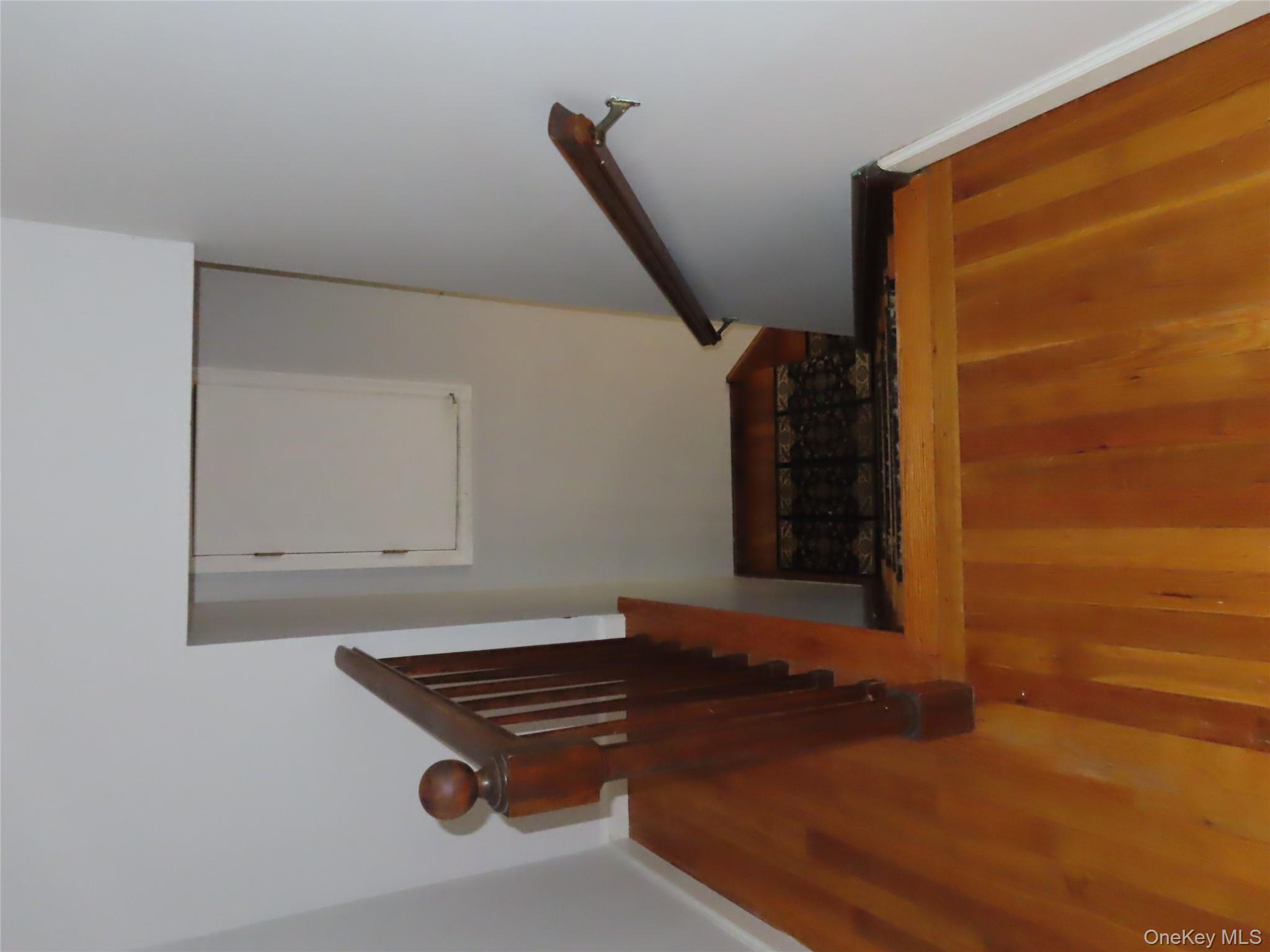 26 Darren Road LaGrangeville, NY 12540 - Photo 16 of 28 Staircase featuring wood finished floors and baseboards