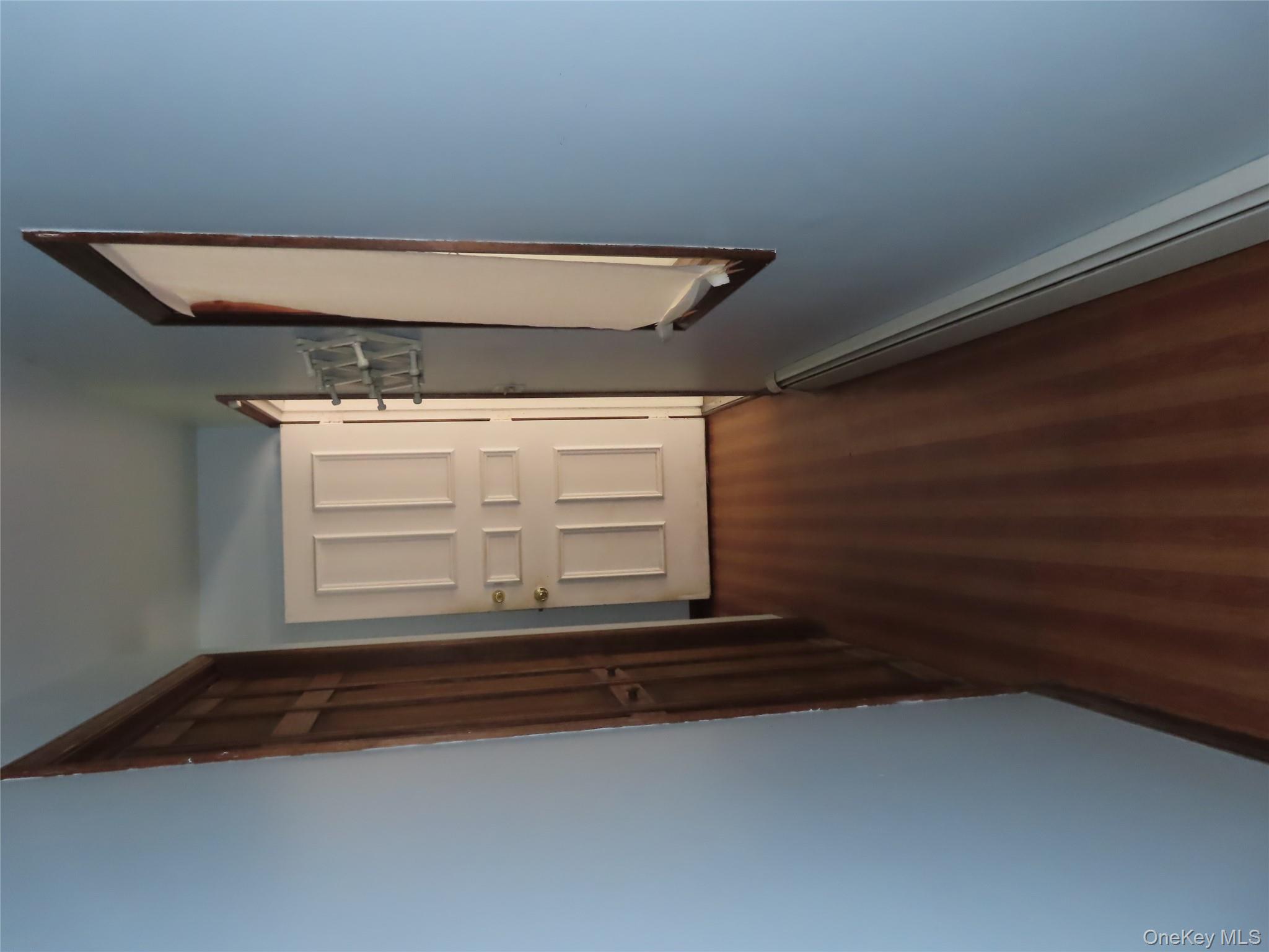 26 Darren Road LaGrangeville, NY 12540 - Photo 24 of 28 Hall featuring dark wood finished floors