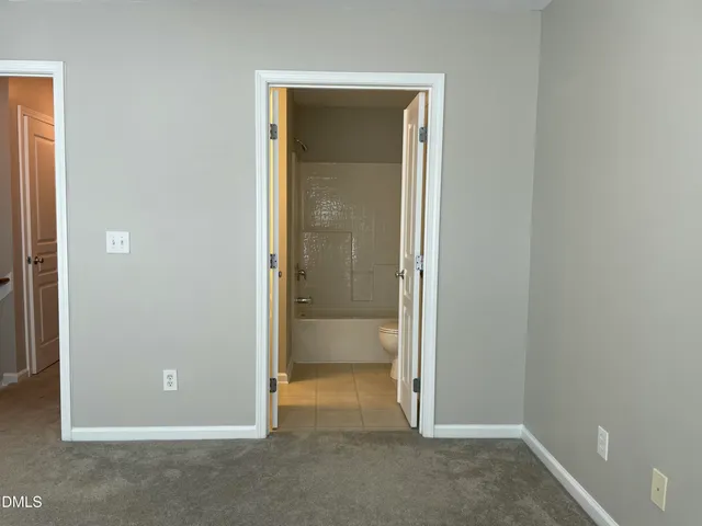 an empty room and closet area