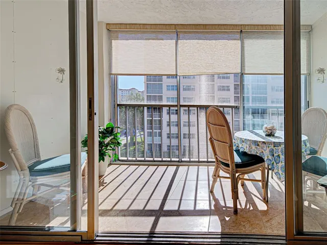 a view of balcony with a potted plant