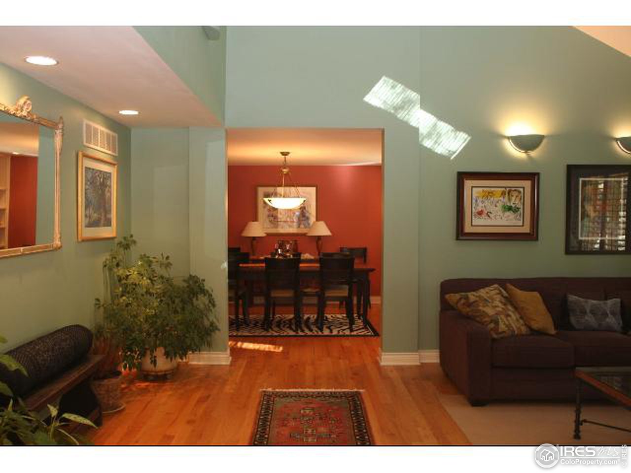 7121 Four Rivers Road Boulder, CO 80301 - Photo 14 of 17 a living room with furniture and wooden floor