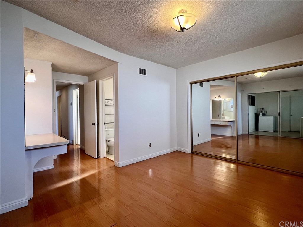 8716 Duarte Road San Gabriel, CA 91775 - Photo 16 of 21 a view of empty room with wooden floor