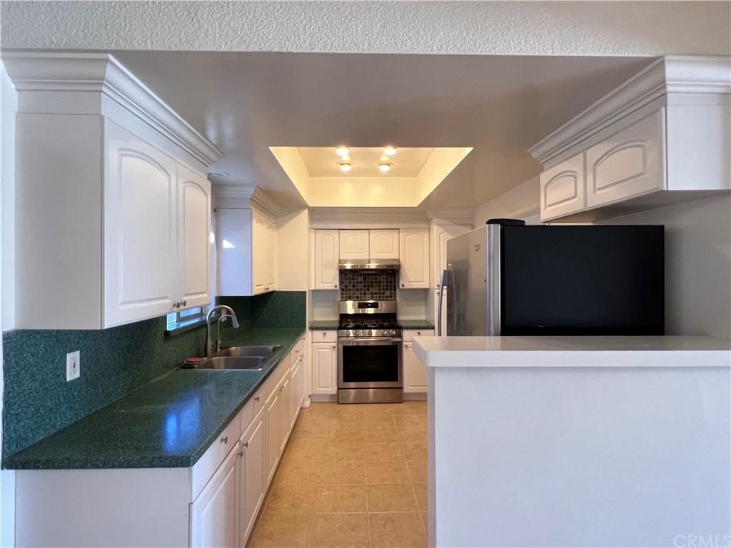 8716 Duarte Road San Gabriel, CA 91775 - Photo 8 of 21 a large kitchen with cabinets