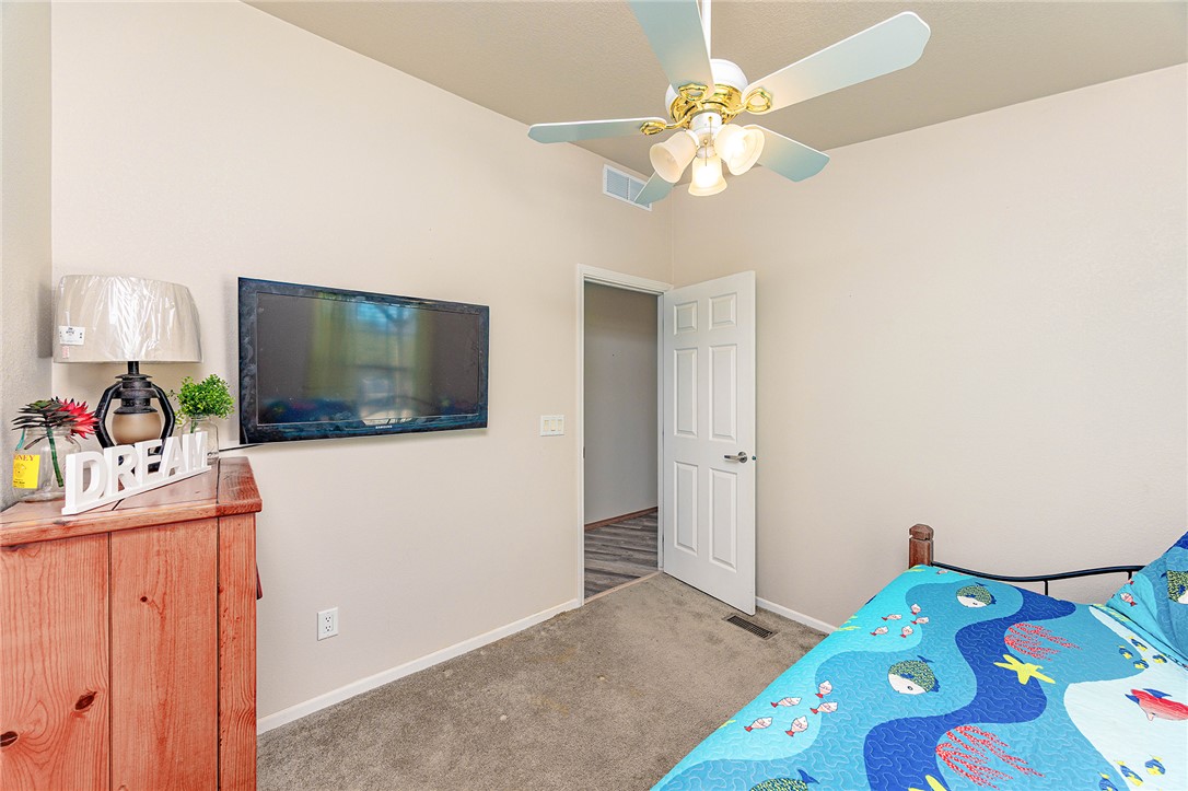 4206 Cordes Road Golden Valley, AZ 86413 - Photo 22 of 60 This room features carpeted flooring and light-colored walls